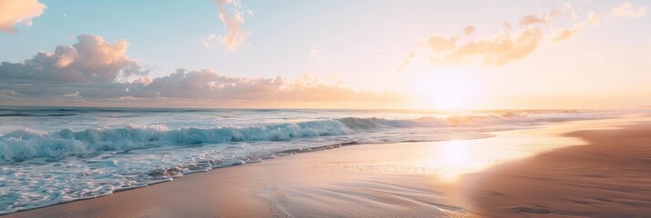 A serene beach at sunrise with gentle waves and a clear sky