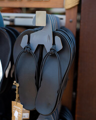 Strap and knotted upper of lady sandals with water-friendly synthetic design, anatomic polyurethane...