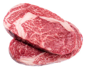 Raw ribeye steaks on white background. File contains clipping path.