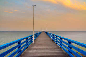 Wooden pier at the sea on sunrise. Zelenogradsk. Kaliningrad region. Russia
