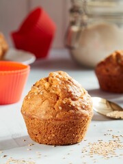 Close-up of a freshly baked cheese muffins with sesame seeds