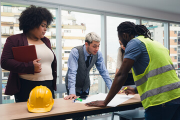Meeting with contracting engineer in office