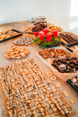 Pastry Made of Cookies Biscuites and Macroons Coated and Baked on the Kitchen Table Top for Christmas