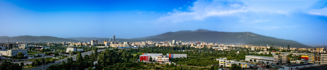 Panoramic aerial view of Sofia, the capital of Bulgaria, with Vitosha Mountain in the background.