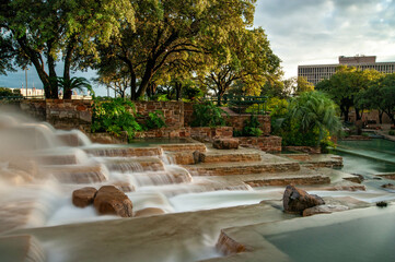 Long exposure of small artificial waterfall in San Antonio, Teaxas