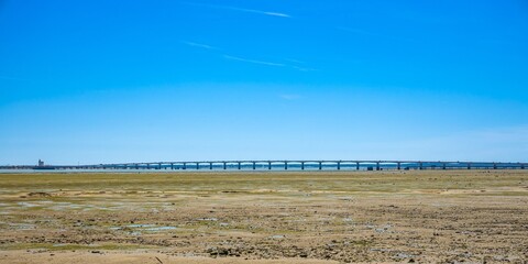 Oleron island bridge on a sunny day at low tide  in France