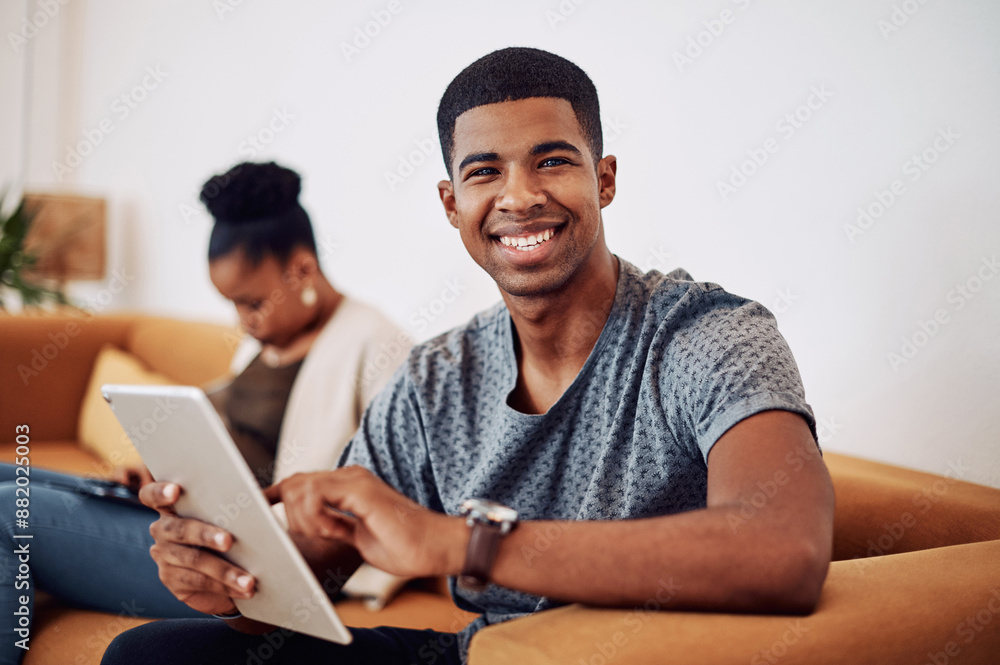 Poster man, tablet and portrait on sofa in office for reading email, research and review feedback of projec