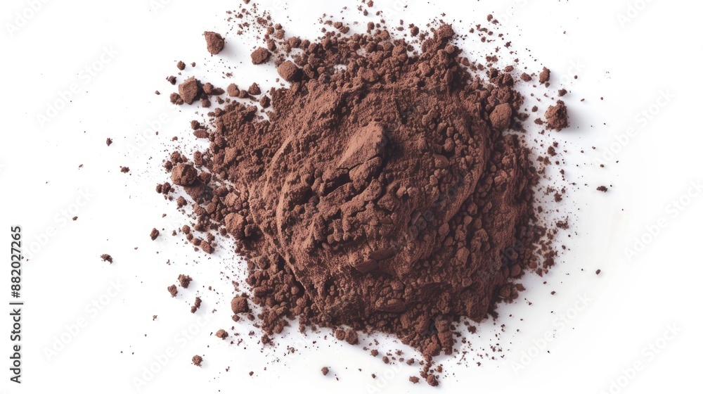 Poster a close-up shot of a small pile of dirt sitting on a white surface, ideal for use in illustrations o