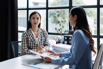 Business financing accounting banking concept. Two Business doing finances and calculate on desk about cost at home office. Businessworking on desk with using calculator, finance accounting.