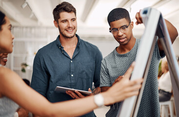 Students, planning and teamwork with ideas, solution or project brainstorming on whiteboard for college. Group of young people training with learning objectives, knowledge and creative vision © MollerFinest/peopleimages.com