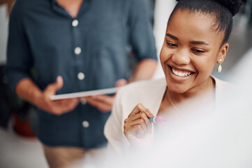 Happy business woman, writing and meeting with whiteboard for presentation, planning or brainstorming at office. Female person or speaker with smile, training staff or employees on ideas at workplace