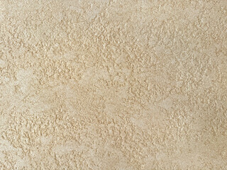 Beige cement textured paint, rough textured paint on wall, seamless background texture