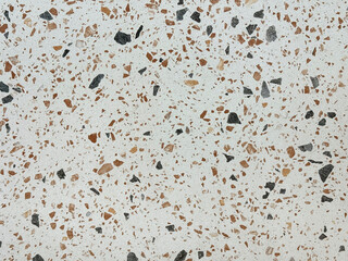 Colorful light terrazzo granite tiles texture. Terrazzo is increasingly being used in contemporary edgy and stylish interior as wall or floor finishing.