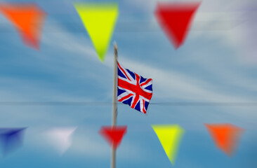 Union jack flag flying with heightened intense colour and surrounding motion blur. Celebratory...