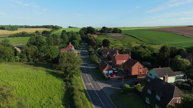 Aerial drone footage of a small Lincolnshire village called Burwell in the UK. Typical English rural village scene. St Michael's Church