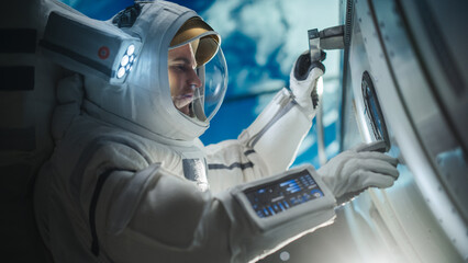 Portrait of a Handsome Young Astronaut Investigating a Satellite in Outer Space. Trained...