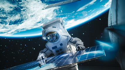 Professional Astronaut Servicing a Solar Electric Panel Outside of a Spacecraft on a Routine Maintenance Check in Outer Space. Space Technology, Sustainable Energy and Exploration Concept