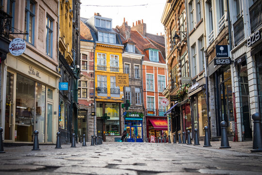 Street and shops in the old city of Lille seen from the ground