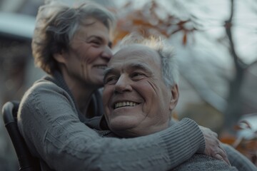 Fototapeta premium Mature couple outdoors, hug, love, smile, support, and faith in marriage. Partnership, retirement, romance, healthy relationship, and care in a garden or park