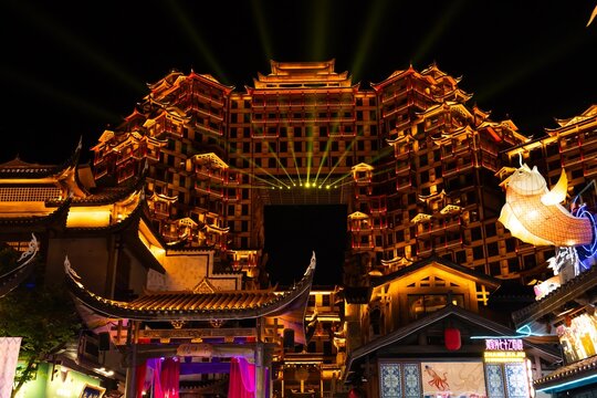 A night city view of zhangjiajie 72 qilou or 72 Strange Buildings on June 9, 2024., Wulingshan Avenue and Shadi Avenue in Yongding District, Zhangjiajie, history of chinese