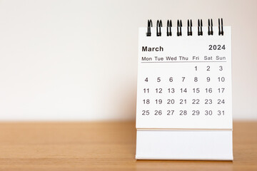 2024 calendar - March month page on the wooden desk