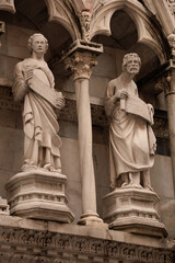 Funny statue of saints in a church 