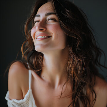 Beautiful model Jinger with radiant smiles and provocative cleavage, showcasing diverse beauty with natural makeup and stylish outfits, exuding confidence and charm in captivating pose.