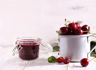 organic cherry jam and fresh berries