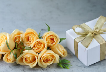 bouquet of roses and gift boxes for congratulations and holidays