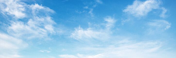 clear blue sky with a few clouds