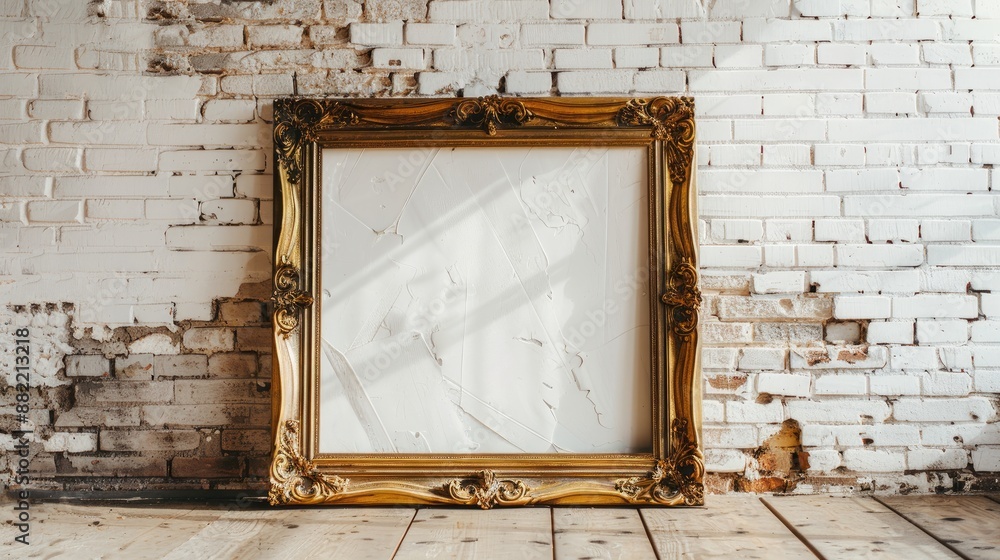 Sticker vintage wooden frame with gold design on white brick wall in empty rustic room