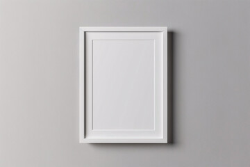  A photo mockup featuring a blank white frame centered on a plain, light gray background. The frame ratio is perfectly balanced, with sharp edges and clean lines, providing an ideal template for