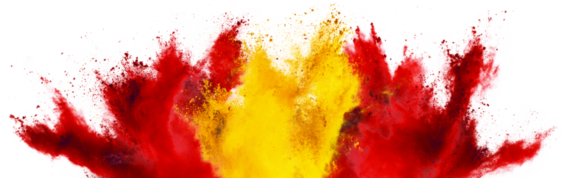 colorful spanish flag red gold yellow color holi paint powder explosion isolated white background. Spain europe celebration soccer travel tourism concept.