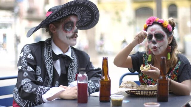 Catrina Adding Lime to Taco and Catrin Salting with Flair
