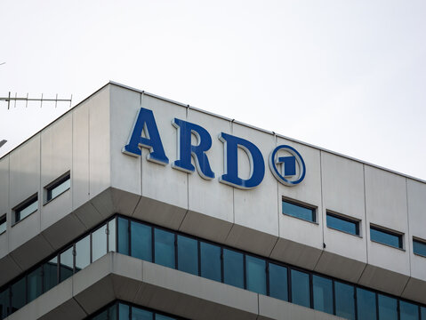 MUNICH, GERMANY - 5. July 2024: ARD logo sign of the public broadcaster. German television channel also called "Das Erste". Office building exterior in Bavaria. Journalism and media service.