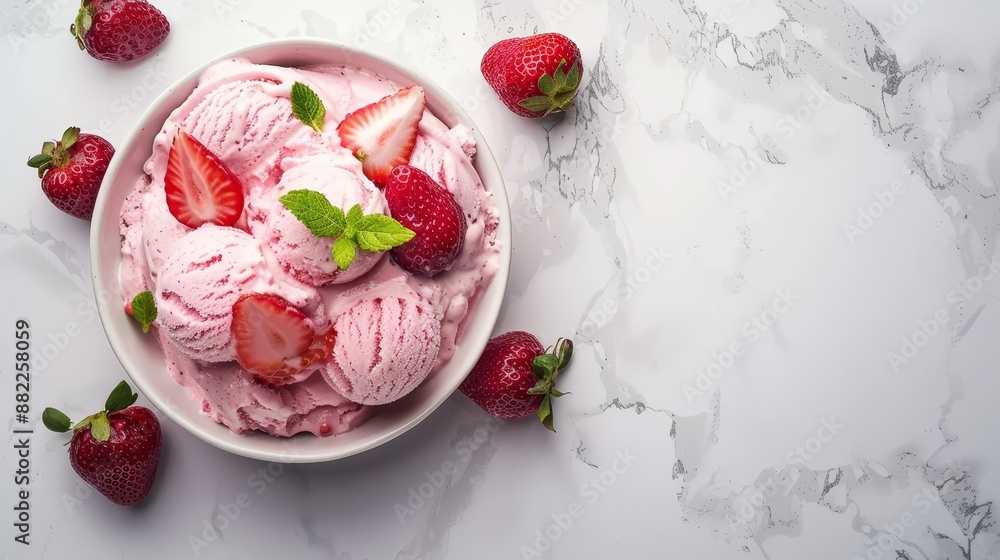 Sticker  A marble countertop displays a bowl of ice cream topped with strawberries and a sprig of mint Behind the scene, a magnificent marble surface adds depth