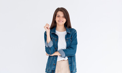 Young european woman, professional entrepreneur standing in casual clothing, smiling and looking confident, white background