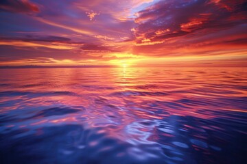 Obraz premium Fiery Sunset Reflecting on the Water