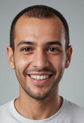 Fototapeta premium Portrait view of a regular happy smiling Algeria man, ultra realistic, candid, social media, avatar image, plain solid background