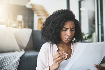 Confused, accounting and tax with woman reading documents in living room of home for bank or planning. Finance, loan and mortgage with person in apartment for investment or savings information