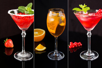 Collage of summer cold drinks with strawberry, orange and red currant in the martini glass on the black background. Close-up.