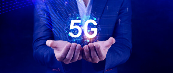 5G network concept, Business using with holographic digital globe with interconnected 5G symbols, 5G technology in modern business and communication, digital transformation.