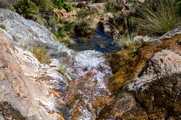 Hiking trail to waterfalls over river Caballos, Sierra de la Nieves National Park in Tolox, Malaga, Spain