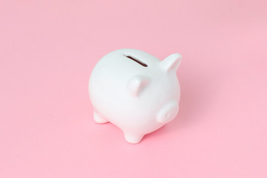 Hucha cerdito blanco en fodo rosa