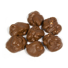 Chocolate Covered Peanut Clusters on White Background