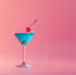 Tropical exotic cocktail with cherry on pink background.