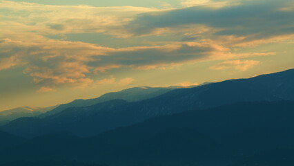 Mountain Top With Sunset. Clouds Float. Blue And Orange Clouds Flow In Sky. Real time.