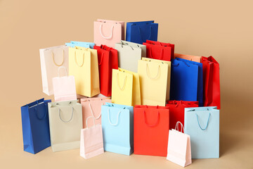 Many shopping bags on brown background