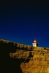 Lighthouse on Cliffs in Portim&atilde;o, Algarve Viewed from a Boat
