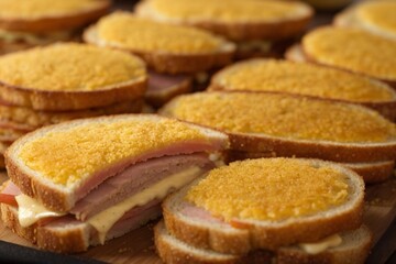 Peameal Bacon: Back bacon coated in cornmeal, often served in a sandwich or as part of a traditional Canadian breakfast.

